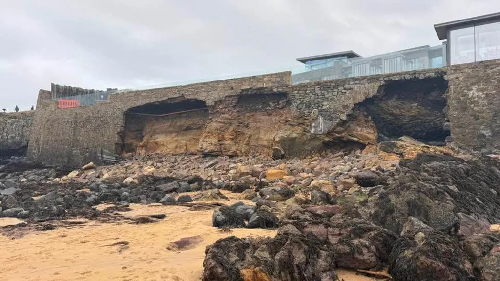 Sea wall of 'California-style' house severely damaged by wave crash