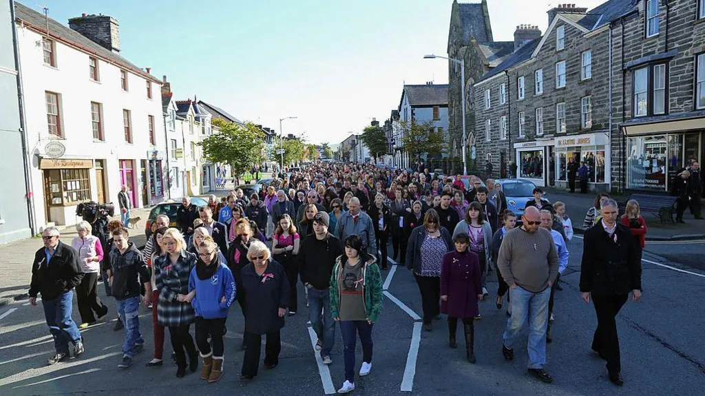 Members of the community of Machynlleth walk together to St Peter's Church for a service with prayers for missing five-year-old April Jones on October 7, 2012 in Machynlleth, Wales. Hundreds of local people walked from April's home in Bryn-y-Gog to the local church in the centre of Machynlleth where the Bishop of Bangor Andrew John officiated. Police have charged local man Mark Bridger with murder, child abduction and attempting to pervert the course of justice. Five-year-old April Jones was abducted from outside her house on Monday night in Machynlleth.