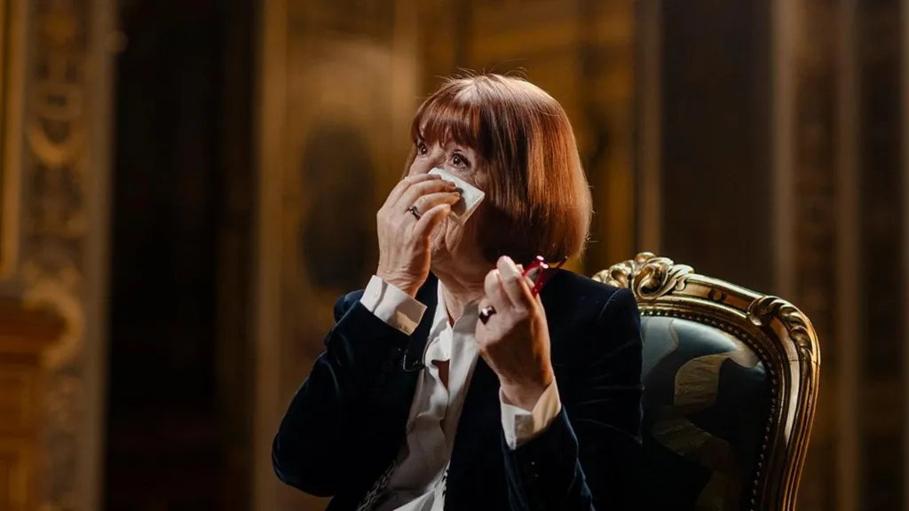 Gisèle Pelicot wipes away tears during an interview with Victoria Derbyshire for BBC Newsnight at the Hôtel de Ville in Paris, France